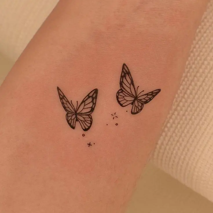 Tatuaje mariposas brazo